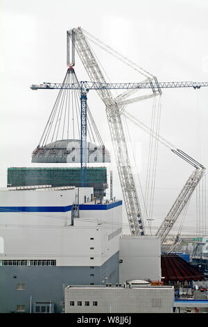 A Containment Dome For The No.2 Reactor Is Being Lifted And Installed ...