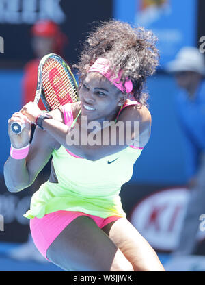 Serena Williams of the U.S. returns a shot to Elina Svitolina of Ukraine during their third round match at the Australian Open tennis tournament in Me Stock Photo