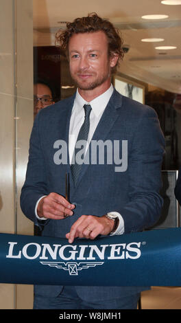 Australian actor Simon Baker Denny poses at the opening ceremony