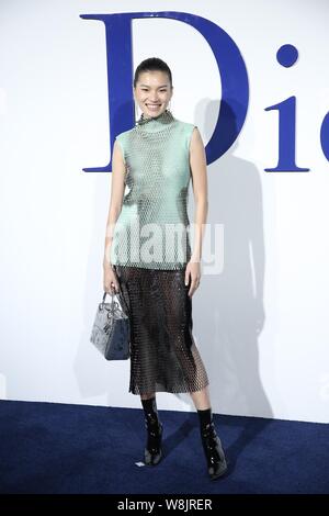Chinese actress and model Daniella Wang poses during the fashion show