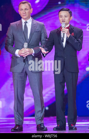 Jack Ma Yun, right, Chairman of Alibaba Group, and English actor Daniel Craig attend the 2015 Tmall 11.11 Global Shopping Festival gala in Beijing, Ch Stock Photo