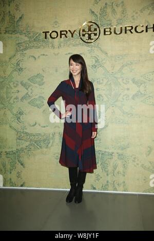 Singaporean singer and actress Fann Wong poses during a promotional event for the 2015 autumn/winter collection of Tory Burch in Taipei, Taiwan, 20 Au Stock Photo