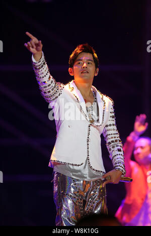 Taiwanese singer Jay Chou performs at the Tianjin concert during his 'Opus 2 Jay 2015 World Tour' in Tianjin, China, 25 April 2015. Stock Photo