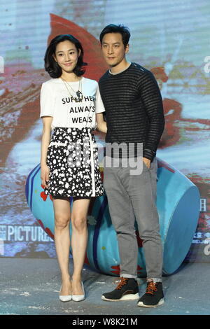 Chinese actress Bai Baihe, left, and Hong Kong actor Daniel Wu pose during a press conference for their movie 'Go away Mr. Tumour' in Beijing, China, Stock Photo