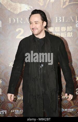 American actor John Cusack smiles during a press conference for his new movie 'Dragon Blade' in Taipei, Taiwan, 12 February 2015. Stock Photo