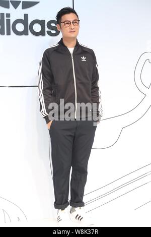 Hong Kong singer and actor Shawn Yue poses during a press conference for Adidas sportswear in Taipei, Taiwan, 16 January 2015. Stock Photo
