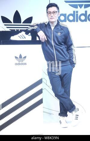 Hong Kong singer and actor Shawn Yue poses during a press conference for Adidas sportswear in Taipei, Taiwan, 16 January 2015. Stock Photo
