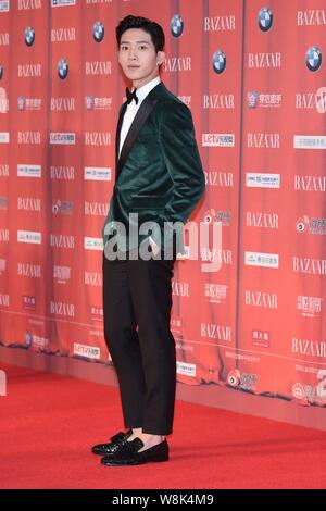 Chinese singer and actor Jing Boran arrives on the red carpet for the 2015 Bazaar Star Charity Night gala in Beijing, China, 23 September 2015. Stock Photo