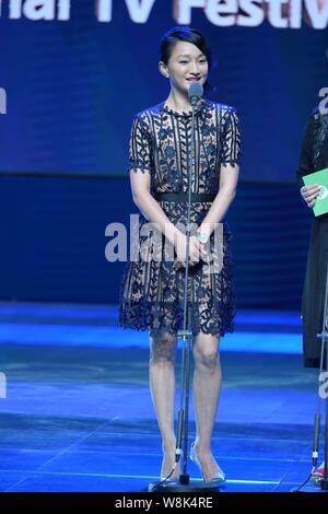 Chinese actress Zhou Xun speaks at the closing ceremony for the 21th Shanghai Television Festival in Shanghai, China, 12 June 2015. Stock Photo