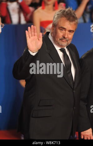 French director Luc Besson arrives on the red carpet for the closing and awards ceremony of the Fifth Beijing International Film Festival in Beijing, Stock Photo