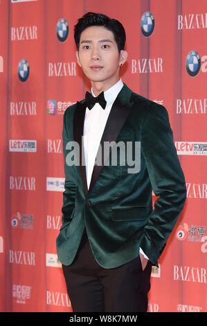 Chinese singer and actor Jing Boran arrives on the red carpet for the 2015 Bazaar Star Charity Night gala in Beijing, China, 23 September 2015. Stock Photo