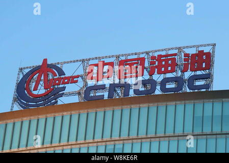 --FILE--View of a logo of CNOOC (China National Offshore Oil Corporation) on the rooftop of the headquarters building in Beijing, China, 23 February 2 Stock Photo