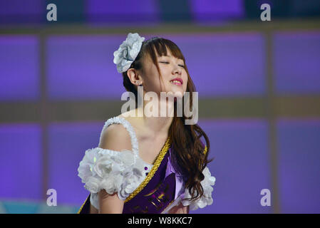 --FILE--Tang anqi of Chinese idol girl group SNH48 attends a concert for the annual idol popularity poll in Shanghai, China, 25 July 2015. Stock Photo