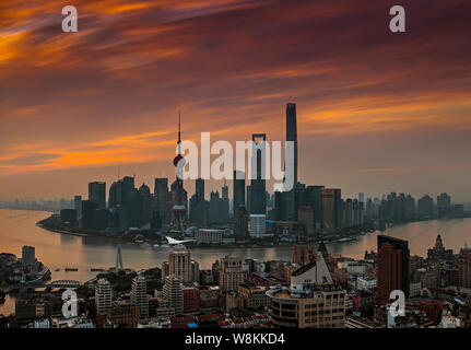 --FILE--A panoramic view of the Bund along the Huangpu River and the Lujiazui Financial District with the Shanghai Tower, tallest right, the Shanghai Stock Photo