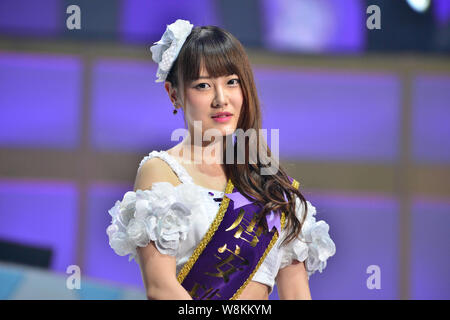 --FILE--Tang anqi of Chinese idol girl group SNH48 attends a concert for the annual idol popularity poll in Shanghai, China, 25 July 2015. Stock Photo