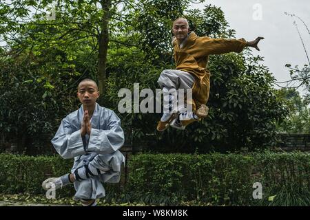 Chinese monks practise kungfu and martial arts at the Western Shaolin Temple in Baihe village, Zhongshan town, Chongqing, China, 19 March 2016.   A ne Stock Photo