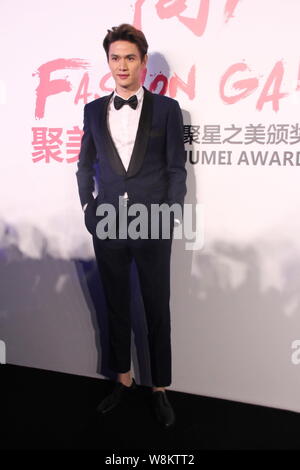 Chinese badminton star Bao Chunlai arrives for the Jumei Award Ceremony 2016 in Beijing, China, 29 February 2016. Stock Photo