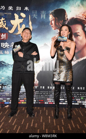 Malaysian actress Michelle Yeoh, right, and Hong Kong director Yuen Woo-ping attend a press conference for the premiere of their new movie 'Crouching Stock Photo