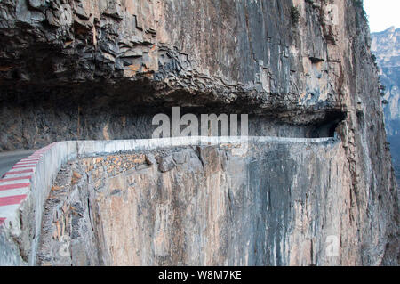 View of a cliff tunnel in Jingdi village, Pingshun county, Changzhi city, north China's Shanxi province, 2 January 2016.   A cliff tunnel was built by Stock Photo