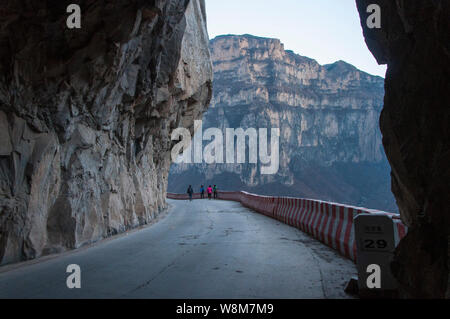 View of a cliff tunnel in Jingdi village, Pingshun county, Changzhi city, north China's Shanxi province, 2 January 2016.   A cliff tunnel was built by Stock Photo