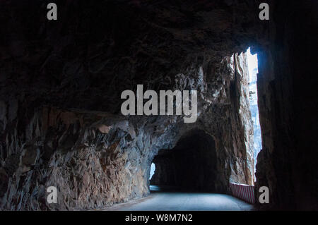 View of a cliff tunnel in Jingdi village, Pingshun county, Changzhi city, north China's Shanxi province, 2 January 2016.   A cliff tunnel was built by Stock Photo