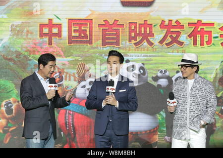 (From left) Chinese actor and director Zhang Guoli, actor Huang Lei and Hong Kong kungfu superstar Jackie Chan attend a press conference to promote th Stock Photo