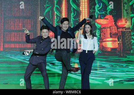 (From left) Xiao Yang and Wang Dali of Chinese duo Chopstick Brothers, and Chinese actress Zhu Zhu attend a press conference to promote the movie 'Kun Stock Photo