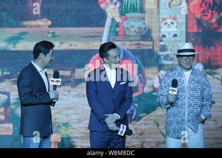 (From left) Chinese actor and director Zhang Guoli, actor Huang Lei and Hong Kong kungfu superstar Jackie Chan attend a press conference to promote th Stock Photo