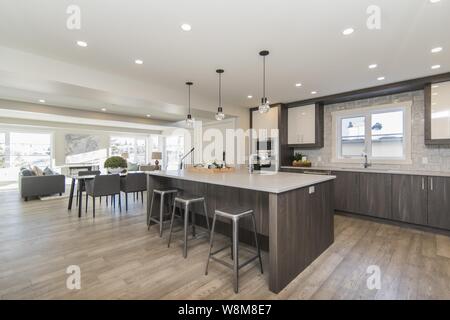 Beautiful shot of a modern house kitchen and dining room Stock Photo