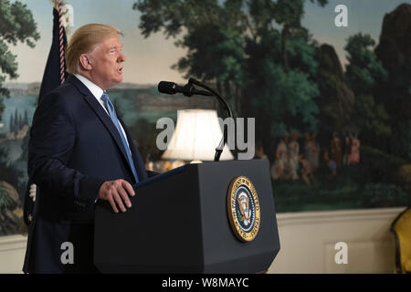 Washington, United States Of America. 05th Aug, 2019. President Donald J. Trump delivers remarks Monday, Aug. 5, 2019, in the Diplomatic Reception Room of the White House regarding the attacks over the weekend in El Paso, Texas, and Dayton, Ohio. People: President Donald Trump, First Lady Melania Trump Credit: Storms Media Group/Alamy Live News Stock Photo