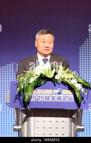 --FILE--Xiao Gang, Chairman of the China Securities Regulatory Commission (CSRC), speaks at the Lujiazui Forum 2015 in Shanghai, China, 26 June 2015. Stock Photo