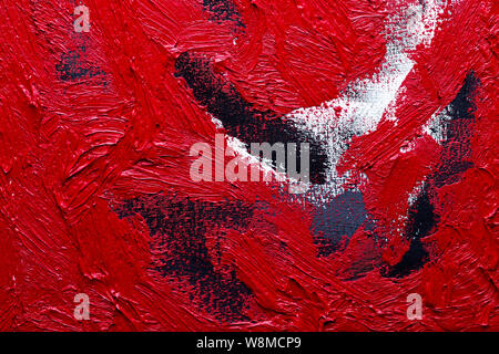 Abstract painted background. Background was painted with red, white and black oil color on canvas by hand. Stock Photo