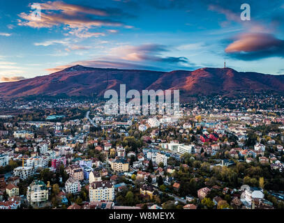 Beautiful aerial shot over Sofia, Bulgaria - amazing weather, colorful skies, perfect sunset over busy streets - impressive cityscape Stock Photo