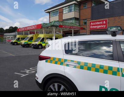 Doctors car at the A&E Dept, The Royal Bolton Hospital, with North West Ambulance Service vehicles, Bolton, Lancashire, Greater Manchester, England UK Stock Photo