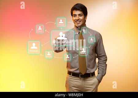 Businessman using a touch screen Stock Photo