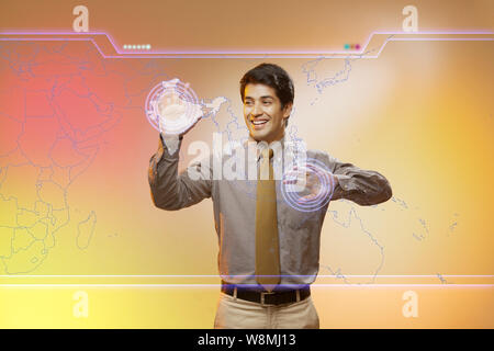 Businessman using a touch screen Stock Photo