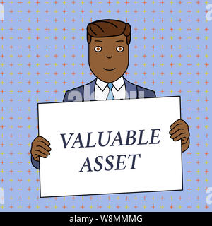 Word writing text Valuable Asset. Business photo showcasing Your most valuable asset is your ability or capacity Smiling Man Holding Formal Suit Big B Stock Photo