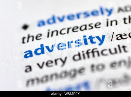MONTREAL, CANADA - JULY 17, 2019: adversity word in a dictionay with meaning. Close-up and selective focus. Stock Photo