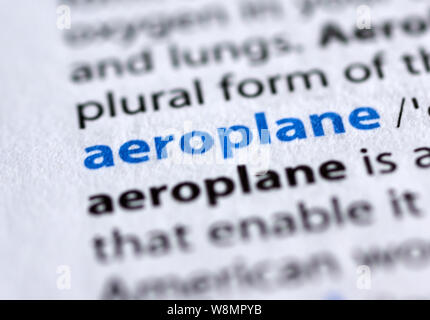 MONTREAL, CANADA - JULY 17, 2019: aeroplane word in a dictionay with meaning. Close-up and selective focus. Stock Photo
