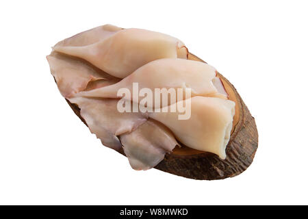 Frozen pilled squid on wooden table Stock Photo