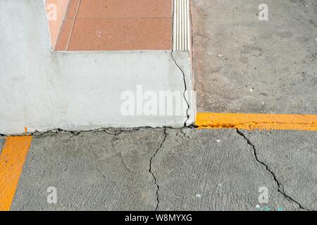 cracks in concrete floor and steps Stock Photo