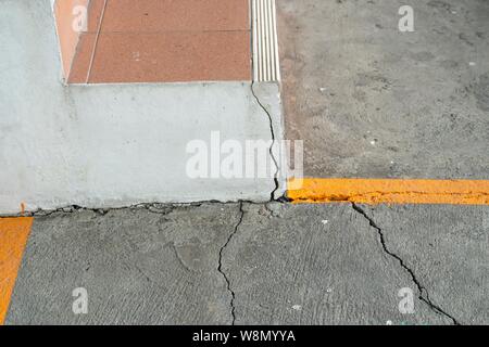 cracks in concrete floor and steps Stock Photo