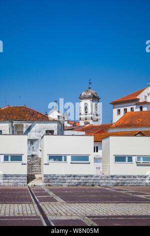 Old Portuguese street. Classic architecture and church from Portugal. Vintage cultural style. Stock Photo