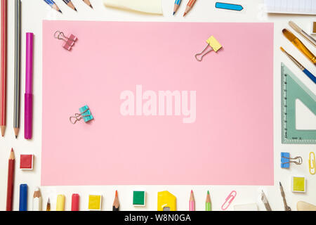 School supplies on pink background - top view Stock Photo