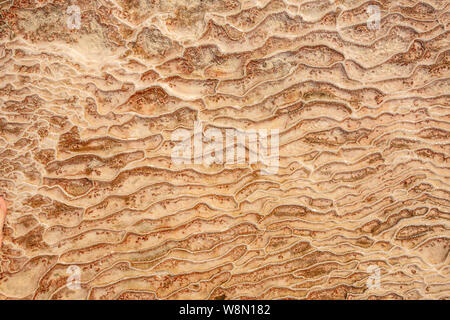 Natural mineral limestone background, Pamukkale pool surface texture. Stock Photo