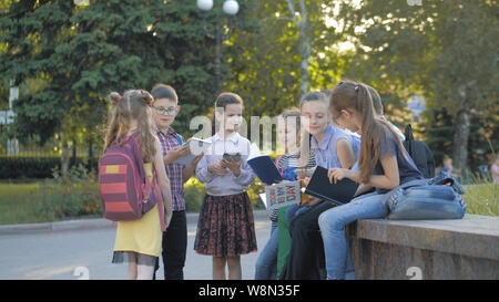 Cute kids study with books and notebooks Stock Photo