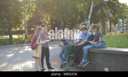 Cute kids study with books and notebooks Stock Photo