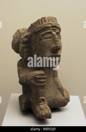 Seated human figure. Stone. Aztec culture. Late Postclassic Period (1250-1520 AD). Central Mexico. Museum of the Americas. Madrid, Spain. Stock Photo