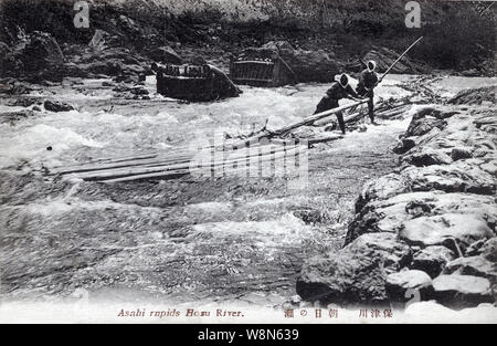 1910s Japan - Japanese Log Raft ] — Two men navigate a log raft at the  Kanagi Rapids (金岐の瀬) of Hozugawa River (保津川) in Kyoto. For centuries the  river was used