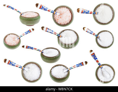 set from ceramic salt cellar with spoon with various salts isolated on white background Stock Photo
